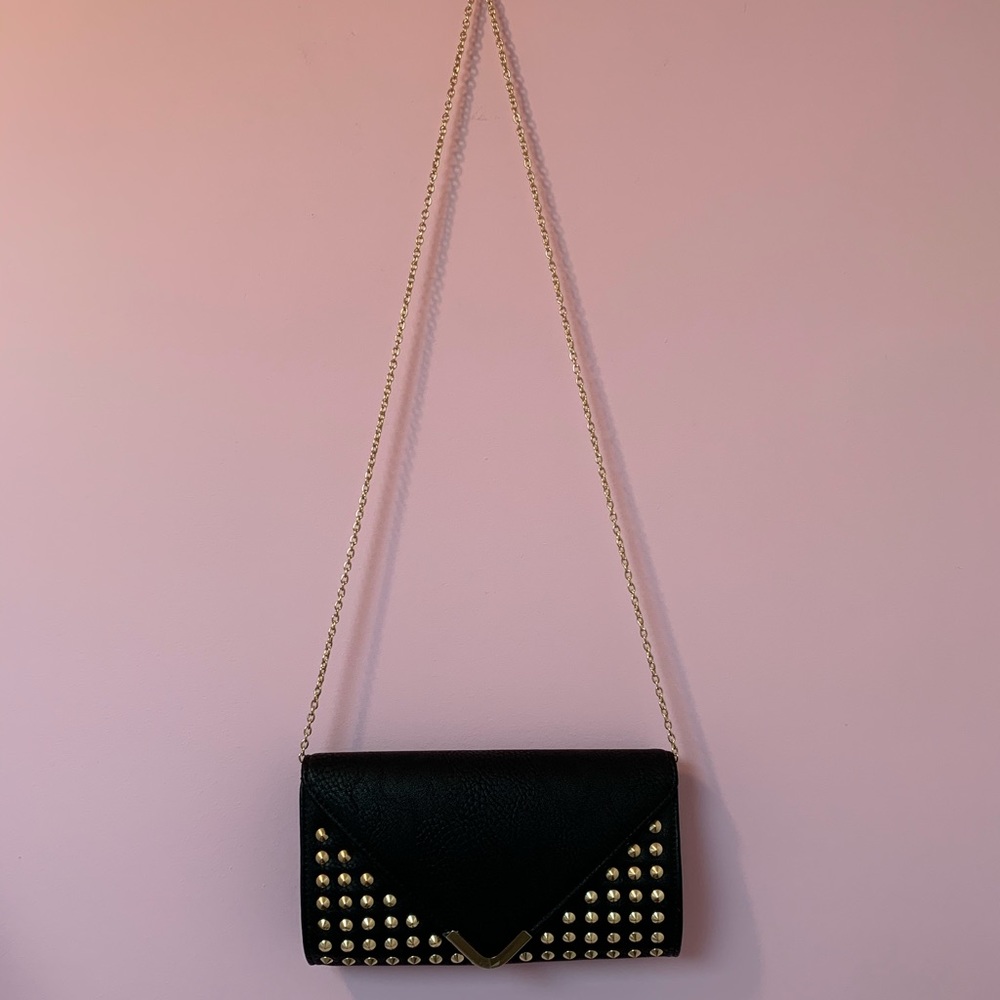 Clutch/Purse Convertible bag.